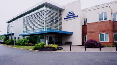 Exterior view of a senior living facility entrance