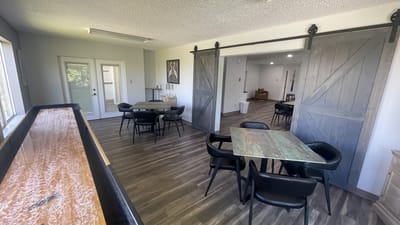 Bright common area with tables and seating