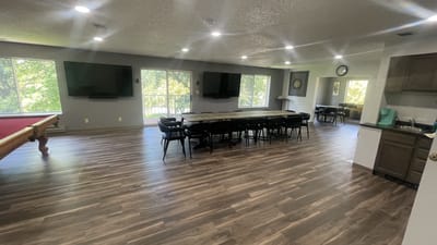 Interior common area with tables and chairs