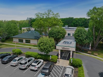 Aerial view of the facility entrance and parking area