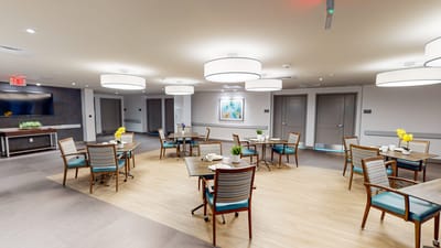 Bright dining area with tables and chairs