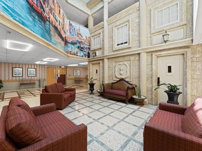 Cozy common area with seating and artwork