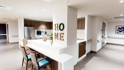 Bright interior of a living space with the word 'HOME'