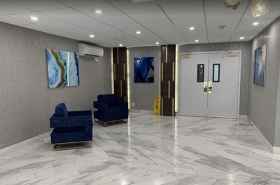 Modern interior of a facility lobby with seating