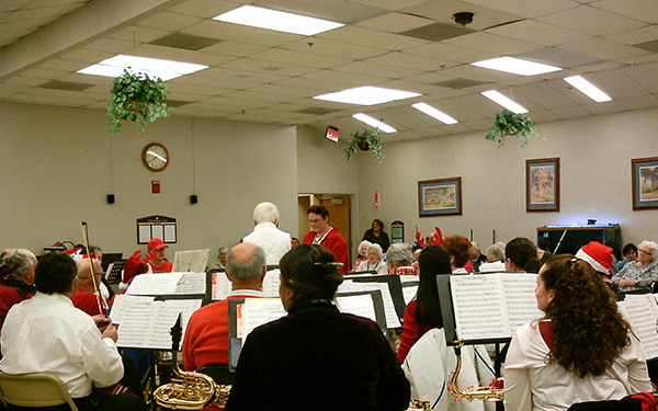 Residents enjoying a live music performance in a festive setting