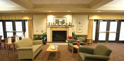 Cozy common area with seating and a fireplace