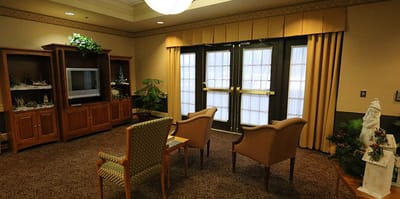 Common area with seating in a senior living facility