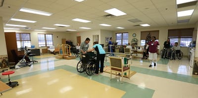 Residents participating in a physical therapy session