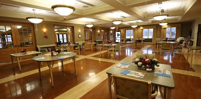 Bright interior of a common activity area with tables