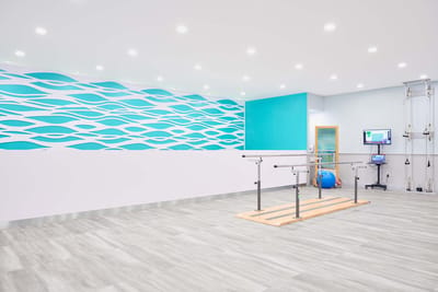 Interior view of a rehabilitation gym with equipment