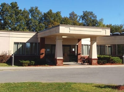 Exterior view of a senior living facility entrance