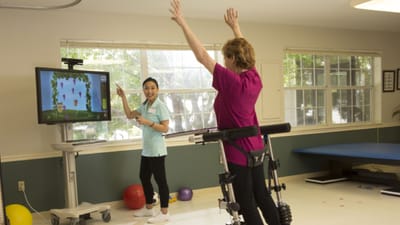 Residents engaging in a physical activity class indoors