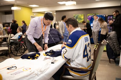 Residents and staff enjoying an event with activities