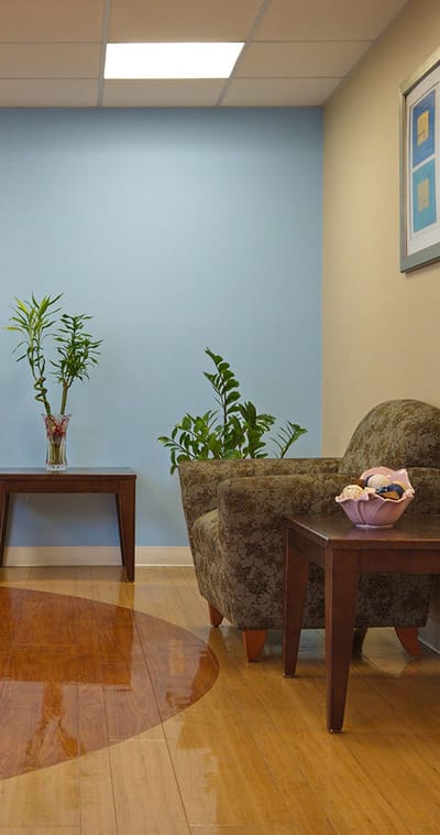 Cozy seating area with plants in a lounge space