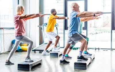 Sunnyside Care Center, Nursing Home in East Syracuse, NY — Seniors participating in a group fitness class indoors