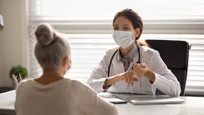 Doctor consulting with a senior resident
