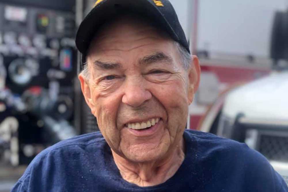 Senior man smiling outdoors