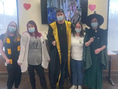 Staff and residents participating in a themed event