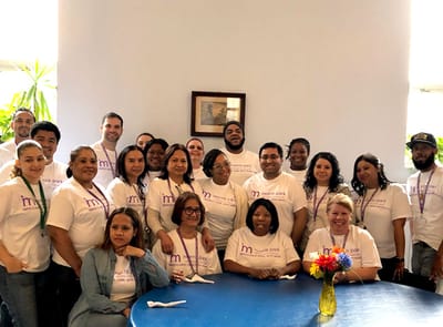 Group of staff members in a common area