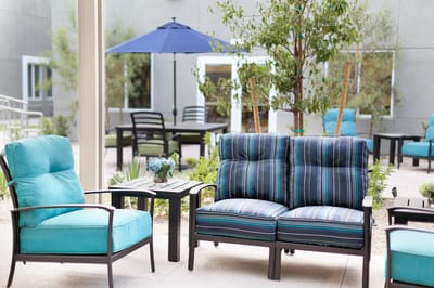 Stylish outdoor seating area with chairs and table