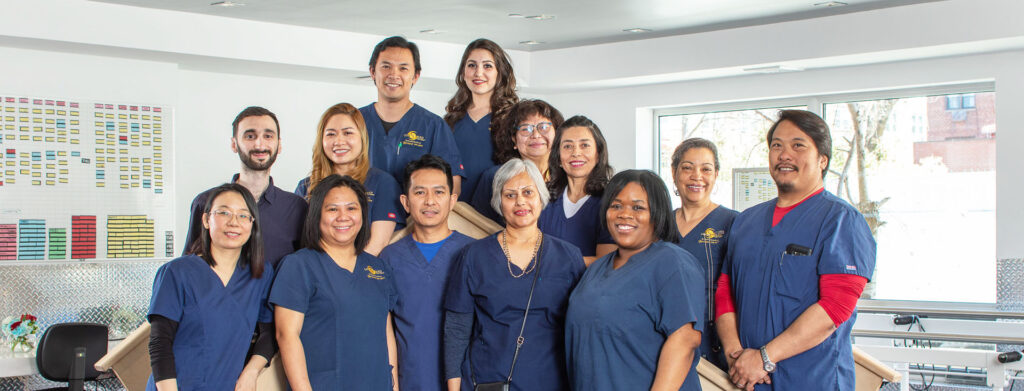 Group photo of staff members in a friendly atmosphere