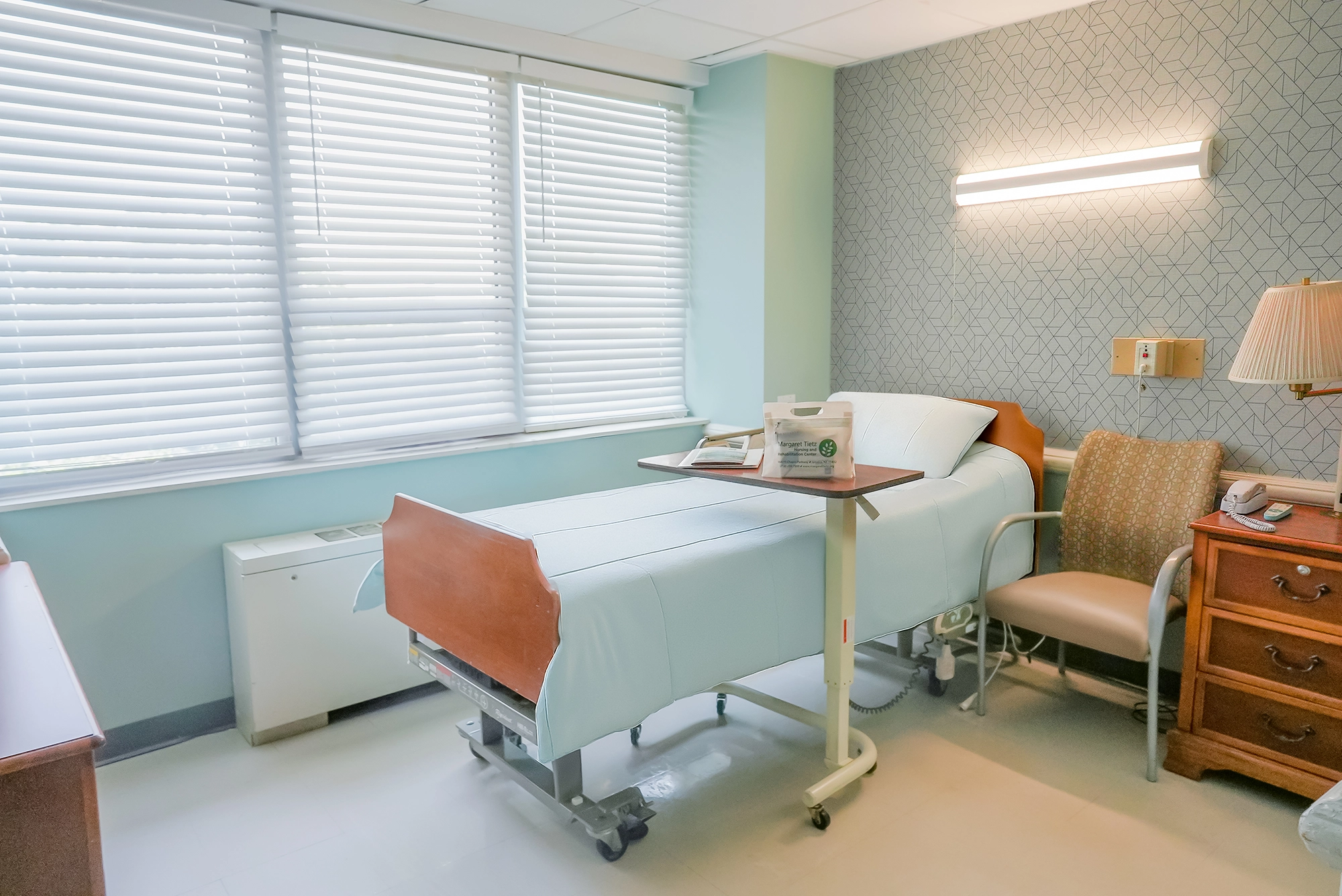 A well-furnished private resident room in a senior facility
