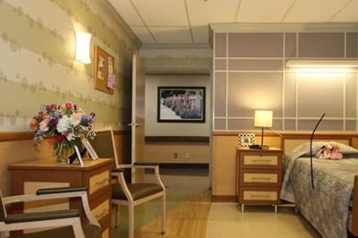 Cozy interior of a resident's room with floral decor