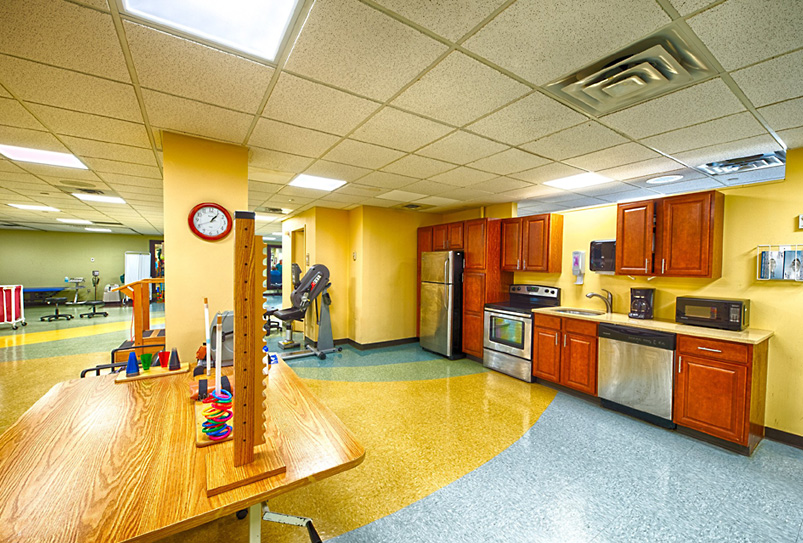 Bright activity room with equipment and appliances