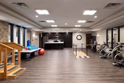 Interior view of a fitness area with exercise equipment