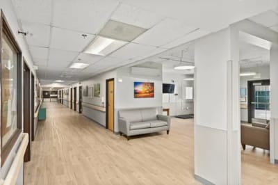 Bright interior hallway with seating areas