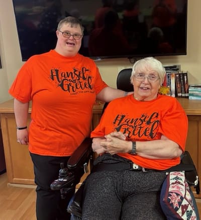 Residents enjoying an activities event in bright shirts
