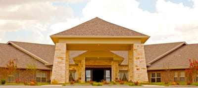 Exterior view of a senior living facility entrance