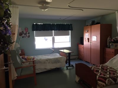 Interior view of a resident room with furniture