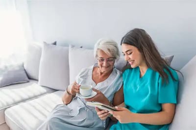 Caregiver and resident enjoying time together