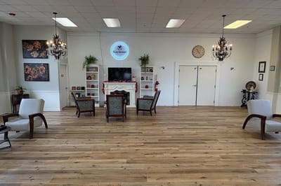 A bright common area with seating and decor