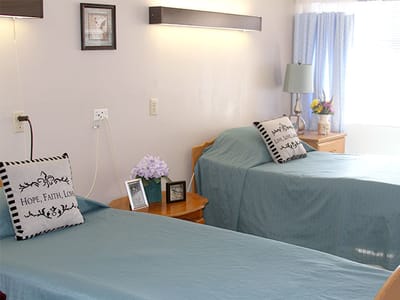 A cozy interior view of a shared resident room