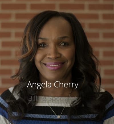 Portrait of a billing specialist with a warm smile