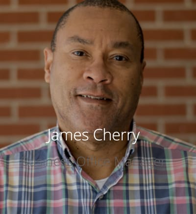 Portrait of a man in a plaid shirt
