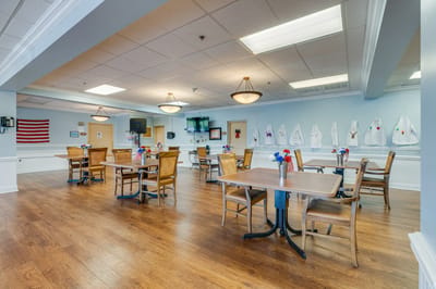 Dining area with tables and chairs in a facility