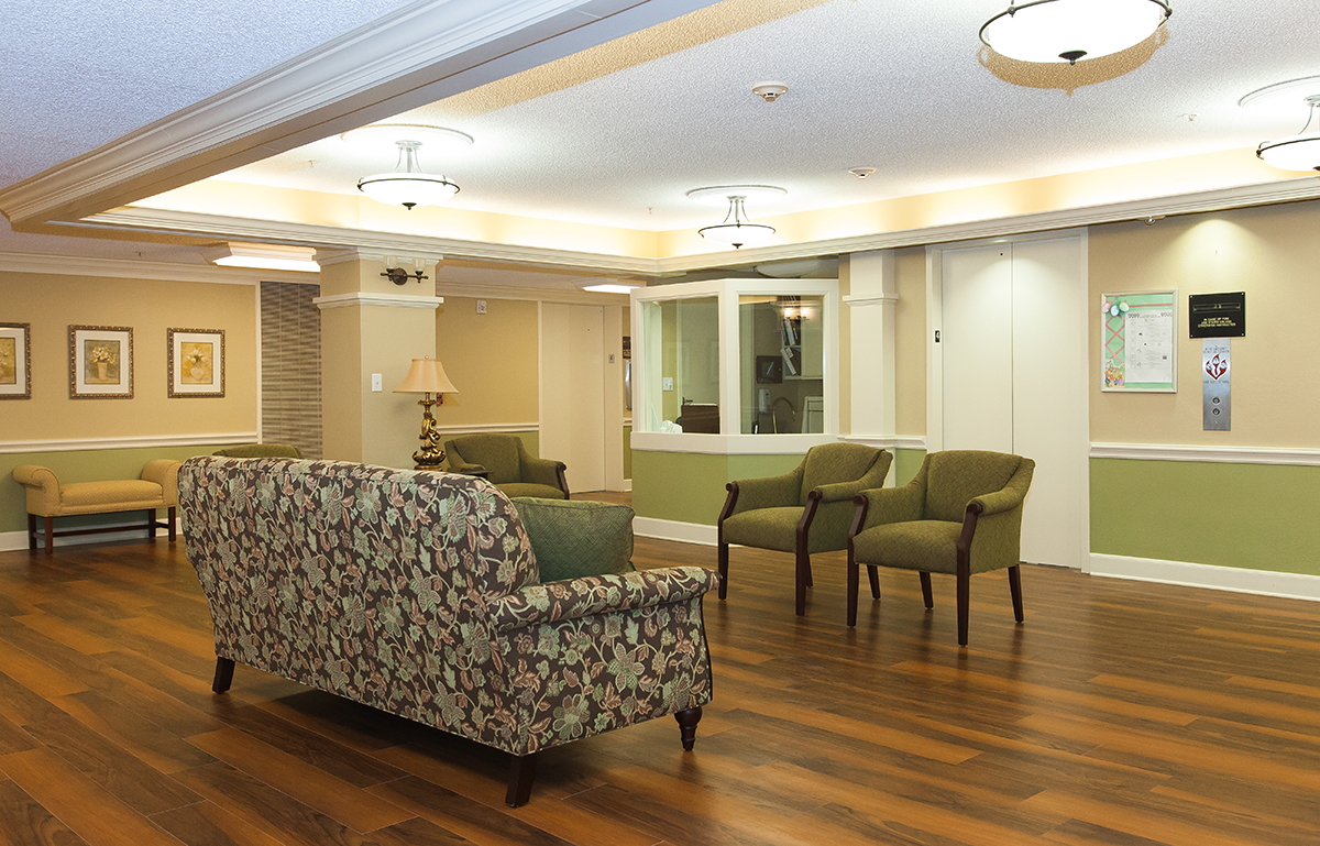 Bright common area with seating and decorative elements