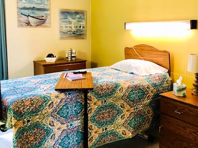Cozy private room with colorful bedding and decor