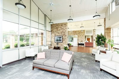 Bright lobby area with seating and natural light