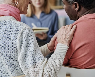 Residents enjoying a conversation in a comfortable setting