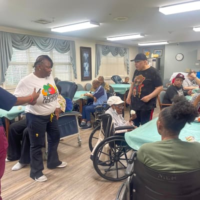 Residents enjoying ice cream in a common area