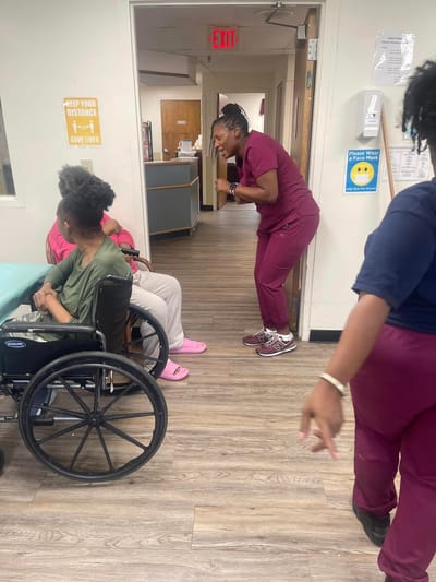 Staff interacting with residents in a common area