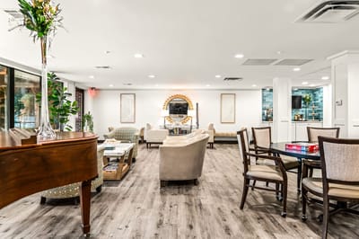 Bright common area with seating and plants