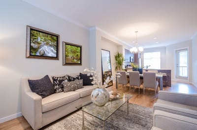 Well-decorated common area with seating and dining space