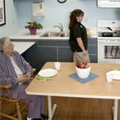 American Lutheran Home-Mondovi, Nursing Home in Mondovi, WI — Senior living kitchen with resident and staff member
