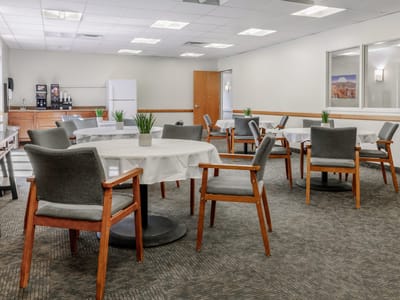 Bright dining room with tables and chairs
