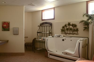 Bright interior view of a bathroom with a tub